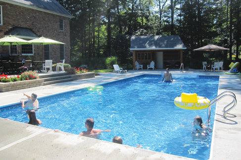 Fiberglass in-ground swimming pool installed by Waide’s Swimming Pools & Spas in Erie, PA.
