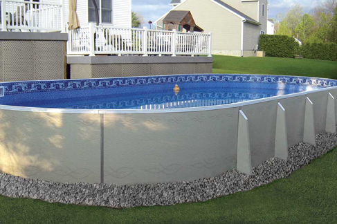 Oval 4 foot deep swimming pool installed in back yard in Erie, PA area.